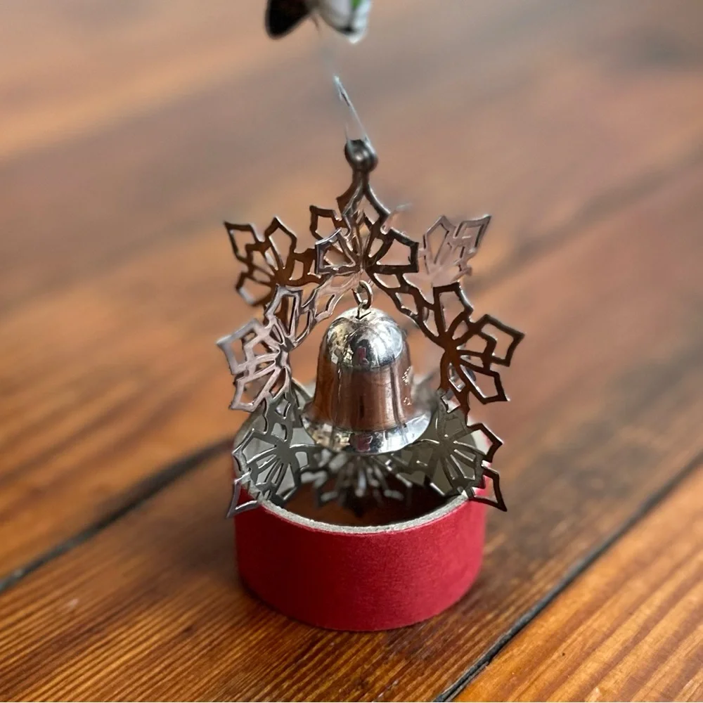 Vintage Reed & Barton silver spinning snowflake  & bell Christmas ornament